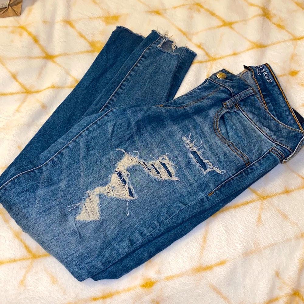 American Eagle Ripped Jeans With Patches Above the Knee. 12